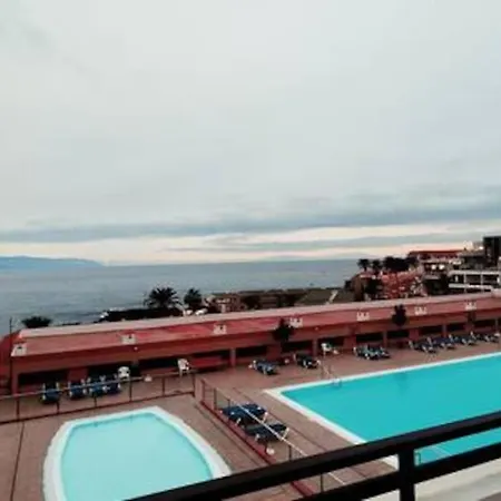 Puesta De Sol En Playa La Arena Пуэрто-де-Сантьяго